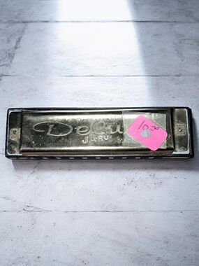 Japan-Made Harmonica in Silver with Black Comb